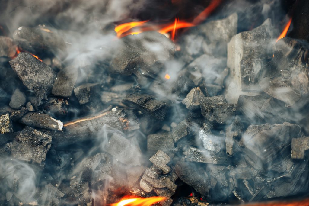 actively smoldering embers of fire coal barbeque